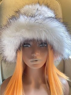 This beautiful incredibly soft faux fur hat is a must have for the fall and winter season.It is stylish and warm and can be dressed up or down. The head circumference of the hat is about 22-23inches (56-60cm) so almost everyone should fit :)  The hat is made out of Vegan Fur and is super soft and fluffy:) For any different color requests please send me an email:) Rave Hats, Fuzzy Bucket Hat, Faux Fur Hat, Festival Hat, Fake Fur, Fur Hat, Fur Coats, Bucket Hats, Head Circumference