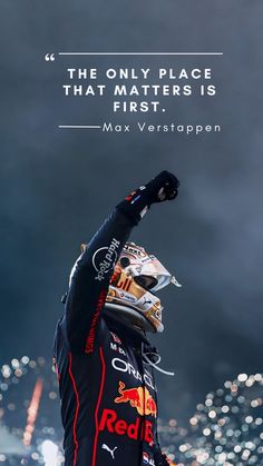 a man in a red bull outfit raising his fist up with the words, the only place that matters is first max verstappen