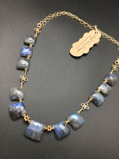 "This necklace is made up of 11 faceted AAA blue sheen Madagascar Labradorites. The chain of this necklace is 14k gold fill and measures 18\" inches at the shortest and 24\" inches at the longest. This necklace is a great statement piece to add to you collection, the flashy blue of the labradorite is absolutely stunning! Proudly handmade in the U.S.A by me!" Neck Art, 11 Stone, Jewelry Staples, Mixed Metal Earrings, Artisan Necklace, Beaded Jewlery, Jewellery Inspiration, Head Jewelry, Labradorite Necklace