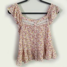 Cute Peasant Style Top From Lucky Brand, New With Tags, Size Xs Extra-Small. Ruffles On Straps And Hem, Buttons And Lace Trim In Front. 100% Viscose, Machine Wash Cold. 16" At Bust (Laid Flat), 21" From Shoulder To Hem. Smoke- And Pet-Free Home. White Ditsy Floral Print Summer Top, White Ditsy Floral Print Top For Summer, White Cotton Blouse With Ditsy Floral Print, White Cotton Top With Ditsy Floral Print, Casual Flowy Blouse With Ditsy Floral Print, White Fitted Ditsy Floral Print Blouse, White Fitted Blouse With Ditsy Floral Print, Casual Flowy Peasant Top For Day Out, Flowy Casual Peasant Top For Day Out