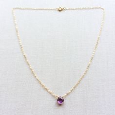 This is a Amethyst necklace. The February birthstone necklace is made of natural faceted Amethyst. This purple necklace is great for layering with other gold necklaces. This simple gold necklace is great to go with everyday outfit. Amethyst is February birthstone. This Amethyst jewelry can be a great gift for people who were born in February. The size of the Amethyst is 7mm by 7mm. Measurement: 7mm by 7mm Amethyst S for Sparkle on Etsy https://www.etsy.com/shop/sforsparkleshop ------------------ Purple Amethyst Jewelry Gift, Purple Necklace With Adjustable Chain For Gift, Spiritual Purple Round Pendant Necklace, Dainty Amethyst Crystal Necklace For Gift, Gold Amethyst Jewelry With Delicate Chain, Amethyst Birthstone Necklace With Round Pendant, Purple Gemstone Pendant Necklace, Purple Pendant Birthstone Necklace As Gift, Purple Jewelry With Adjustable Chain As Gift