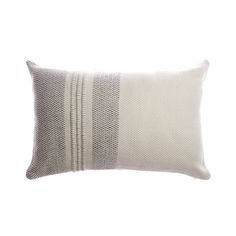 a white and grey striped pillow on a white background