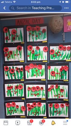 an art project with red poppies and green grass on the side of a bulletin board