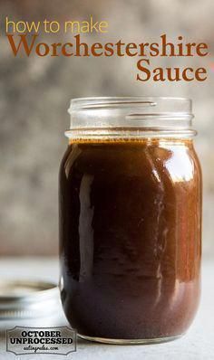 a jar filled with chocolate sauce sitting on top of a table