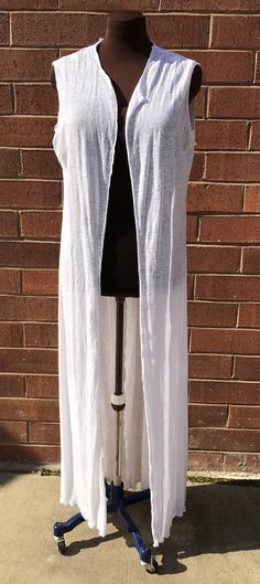 Cream, linen long duster Fits size: xs-m Summer Linen Cardigan For Layering, Casual Long Cover-up For Daywear, Casual Long Daywear Cover-up, Casual Long Spring Duster, Casual Long Duster For Spring, Long Cotton Cover-up For Spring, Long Casual Summer Duster, Casual Long Duster For Summer, Casual Long Summer Duster