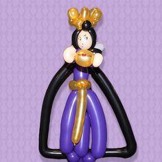 an inflatable balloon shaped like a woman holding a baby on top of it