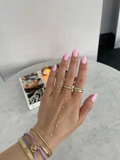 Jewellery Stack Gold, Hand Accessories Aesthetic, Hand With Jewelry, Hand Stack, Bubblegum Pink Nails, Pink Almond Nails, Diamond By The Yard