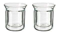 two clear glass vases sitting next to each other