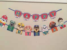 a birthday banner with cartoon characters on it