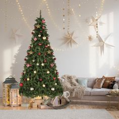 a decorated christmas tree in a living room