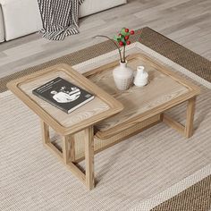 a coffee table sitting on top of a rug in a living room