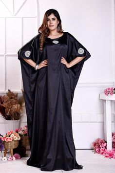 "\"Indulge in the allure of our Black Embellished Satin Kaftan for Women, a testament to timeless sophistication. Crafted from sumptuous satin fabric, this kaftan drapes gracefully, offering a silhouette that's both flattering and comfortable. Its intricate embellishments bestow an air of opulence, making it the perfect choice for special occasions or glamorous evenings. With this kaftan, you'll radiate confidence and style, effortlessly capturing attention and admiration wherever you go.\" ONE SIZE FIT ALL KAFTAN   ( Small to 8XL)   Regular Kaftan Length 60\"  Material: satin  Quality: Excellent (Best Quality On Our Stock) Ready Stock Items We ship Same Day World Wide You will get within 4-5 working days.  Product Details: Condition : - Brand New  Brand       : - Silk Kaftan Type Evening Embellished Silk Kaftan, Evening Silk Embellished Kaftan, Silk Kaftan For Evening And Eid, Elegant Silk Floor-length Kaftan For Evening, Elegant Embellished Kaftan For Formal Occasions, Elegant Embellished Formal Kaftan, Silk Floor-length Evening Abaya, Silk Floor-length Abaya For Evening, Elegant Fitted Embellished Kaftan