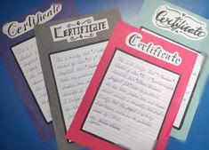 three different types of writing paper on a blue background with the words certificate written in cursive writing