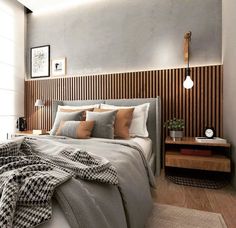 a bed sitting in a bedroom next to a wooden headboard on a white wall