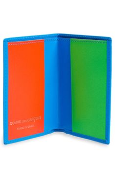 Electric-hued leather with a sleek, modern matte finish shapes the clean lines and slim profile of this compact card case. Style Name:Comme Des Garçons Super Fluo Card Case. Style Number: 6085767. Available in stores. Modern Bifold Card Holder With Interior Slots, Modern Leather Card Holder With Interior Slots, Modern Green Wallet For Business, Modern Trifold Wallet With Id Window, Modern Green Bifold Card Holder, Modern Rectangular Card Holder With Interior Slots, Modern Wallets With Card Slots, Modern Leather Trifold Wallet With Id Window, Modern Leather Trifold Card Holder