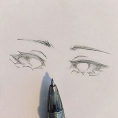 a pencil drawing of an eye with the eyes drawn to it's right side