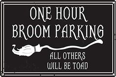 a sign that says, one hour broom parking all others will be told on it