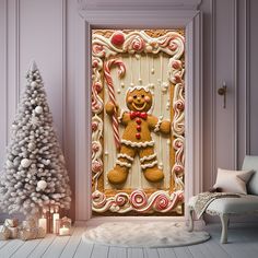 a gingerbread man with candy canes in front of a christmas tree