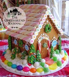 a decorated gingerbread house on a table