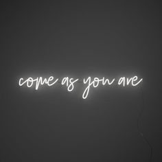 a neon sign that says come as you are