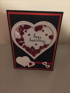 an anniversary card with hearts in the shape of a heart