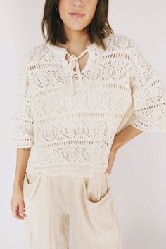 Find your perfect match with this charming cream-colored top. Featuring a crochet pattern and a front tie, this top offers a slight oversized fit for a comfortable and stylish look. Don't wait any longer - the Finally Found You Top is the missing piece to your wardrobe! Details Crochet pattern Front tie Slight oversized fit Cream color Sizing Approximate measurements: SIZE LENGTH BUST Small 22" 52" Medium 23" 54" Large 23.5" 58" Fabric has stretchModel is 5’8” wearing small Material 60% Cotton 4 Vest Cardigan, The Missing Piece, Found You, Missing Piece, Cardigan Vest, The Missing, Top Sales, Lightweight Knit, Oversized Fits