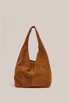 PRE - ORDER Shipping From October 16th , 2024 Crowned by ELLE magazine as the next must-have bag, the Sienna Suede Hobo Bag is a relaxed shoulder bag with a magnetic stud closure at the top. Sienna is the new perfect slouchy tote to elevate your everyday. Please see product image for most accurate colour. Our VESTIRSI Suede Hobo Bag, Crossbody Saddle Bag, Slouchy Tote, Slouchy Bag, Work Tote Bag, Suede Handbags, Autumn 2024, Leather Coin Purse, Elle Magazine