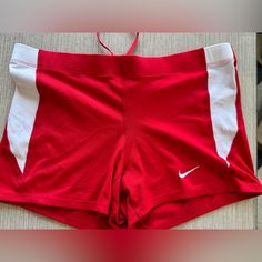 Red Nike Dry Fit Volleyball Shorts. Never Worn Nike Elite Basketball Shorts Women, Red Stretch Swim Trunks With Built-in Shorts, Red Bottoms For Summer Sports Events, Red Sports Bottoms With Built-in Shorts, Red Nike Activewear For Gym, Nike Red Sporty Shorts, Red Cheerleading Shorts For Summer, Red Bottoms For Cheerleading In Summer, Stretch Red Bottoms For Sports Events