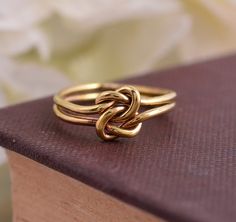 Two Love Knots, Double Knot Ring, Gold Brass Ring, Knot Promise Ring, Gifts For Her, Love Knot Ring, Stacking Ring, Valentines Day Gift Material:- Brass Size:- Any ♥Brass, unlike gold, is a metal that can oxidize over time. To avoid and delay this oxidation, I recommend that you do not sleep with your jewels, and not expose them to water. The ring can be customized on request and the gemstone can be made to any gemstone you want. Same Design Ring Are Upload With Any Gemstone. Please Visit Our Sh Black Obsidian Ring, Best Friend Rings, Gold Knot Ring, Lotus Ring, Simple Rings, Obsidian Ring, Forever Rings, Bridesmaid Rings, Friend Rings