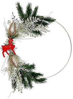 a christmas wreath with white and red decorations on the front, hanging from a metal ring