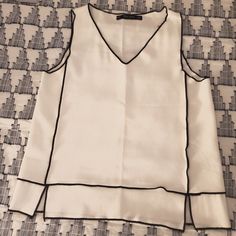 Zara Sleeveless Top/Blouse Nwot Never Worn, Xs White/Off White With Black Trim 17 Inches Pit To Pit Loose Fit Regular Length Cheap Zara Short Sleeve Shirt, Zara Sleeveless Top, White With Black Trim, Zara Top, Zara Black, Black Trim, Zara Tops, Sleeveless Top, Loose Fitting