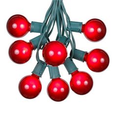 red christmas lights with green wire and white bulbs are on a white background in this image