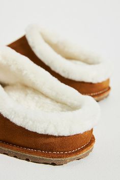 Zermatt Shearling Clogs by Birkenstock in Brown, Women's, Size: 36, Rubber/Suede/Shearling at Anthropologie Winter Suede Clogs With Leather Footbed, Comfortable Winter Mules With Suede Lining, Winter Clogs With Suede Lining And Comfortable Style, Sheepskin Clogs With Leather Footbed And Round Toe, Winter Clogs With Suede Lining, Winter Comfortable Clogs With Suede Lining, Winter Shearling Clogs With Cushioned Footbed, Winter Sheepskin Slip-on Clogs, Winter Closed Toe Clogs With Leather Sole