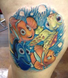 an image of some cartoon tattoos on someone's back side thigh and thighs with fish