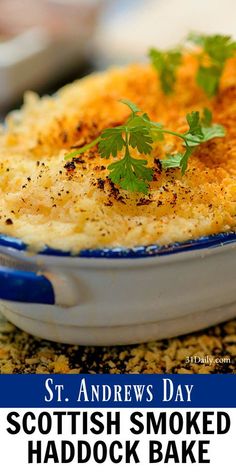 a blue and white bowl filled with food on top of a table