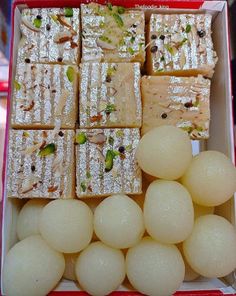 there are many different types of food in the box on this table, including tofu