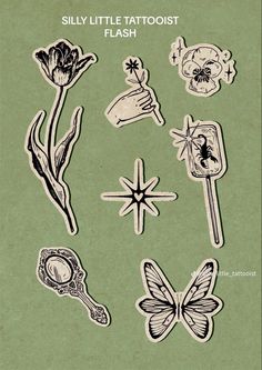 an old book with some stickers and flowers on the cover, in black and white