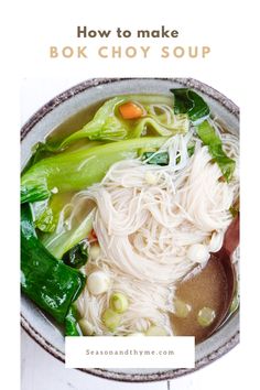 a bowl filled with noodles and vegetables on top of a table