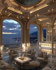 an ornate living room with white furniture and large windows overlooking the ocean at night time