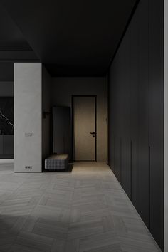 an empty room with black and white walls