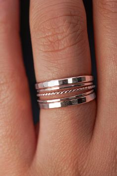 * EXTRA THICK and ULTRA THIN RINGS * The Ultimate Twist Set of 5 Rings - featuring the captivating contrast of thick, thin, and twist textures. This unique set is ideal for mixing and matching. Wear them all at once or seamlessly integrate them into your current ring stack!  This is a SET OF 5 stacking rings: 2 x EXTRA THICK rings 2 x ULTRA THIN rings 1 x TWIST ring Each ring is made of 14K GOLD FILL, 14K ROSE GOLD FILL, or STERLING SILVER metal. SIZING NOTE: We will size up each of these rings Thick Rings, Rope Ring, Rope Rings, Thick Ring, Ring Stack, 5 Rings, Twist Ring, Stackable Rings, Stacking Rings