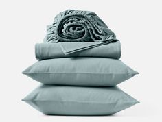 three pillows stacked on top of each other