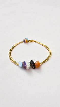 Ignite your Aries spirit with this bold and empowering zodiac gemstone bracelet! Designed for those born under the sign of the Ram (March 21 - April 19), this bracelet features a vibrant blend of Aquamarine, Amethyst, Citrine, Jasper, and Carnelian gemstones known to resonate with Aries's fiery energy, adventurous spirit, and courageous heart.This Aries zodiac bracelet is the perfect way to embrace the magic of your astrological journey. Order yours today and let your Aries spirit blaze!This bra Spiritual Amethyst Beaded Birthstone Bracelet, Spiritual Amber Crystal Bracelet With Gemstone, Spiritual Amber Crystal Gemstone Bracelet, Spiritual Healing Crystal Bracelet With Birthstone, Amethyst Birthstone Bracelet For Healing, Spiritual Chain Bracelet As Gift, Friendship Gemstone Crystal Bracelet, Friendship Crystal Gemstone Bracelet, Crystal Gemstone Friendship Bracelet