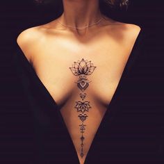 a woman with a tattoo on her back