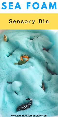 an ocean foamy bin filled with sand and sea animals on the bottom text reads seas foam sensory bin