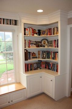 a corner book shelf with many books on it