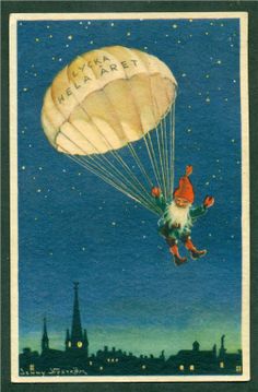 an old postcard with a santa clause parachuter in the sky above a city at night