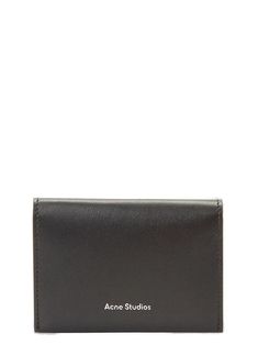 This minimal yet statement-making cardholder from cult-favorite Acne Studios is a must for any fashion insider. Crafted from high-quality Italian leather in a logo-emblazoned print, it holds all essential cards and cash in a slim, compact size that slips easily into any pocket or bag. Made for around-the-clock carry, this leather bi-fold wallet is as durable as it is stylish, bearing the signature of its coveted Scandinavian designer heritage wherever you go. Acne Studios Bag, Acne Shop, Studio Logo, Leather Bifold Wallet, Card Holder Wallet, Women's Bags, Scandinavian Design, Italian Leather, Wallets For Women