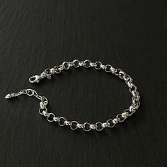 Details: Chain: Sterling Silver Rolo Chain, 6.3mm, plus 1 inch of extension chain Clasp: Sterling Silver Lobster claw clasp Sizes: 5/6 inches, 6/7 inches, 7/8 inches, 9/10 inches Shipping: Ready to ship within one business day Complimentary shipping in the USA Complimentary gift wrap Metal Link Bracelets With Rolo Chain, Modern Rolo Chain Link Bracelet, Metal Chain Bracelets With Round Beads, Modern Round Charm Bracelet With Chain, Everyday Charm Bracelet With Rolo Chain, Modern Round Chain Charm Bracelet, Modern Chain Charm Bracelet, Chain Link Bracelets For Jewelry Making, Modern Link Bracelet With Rolo Chain