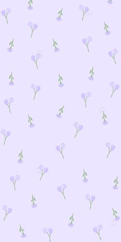 a purple flower pattern with green stems on a light lavender colored background that is slightly overexposed